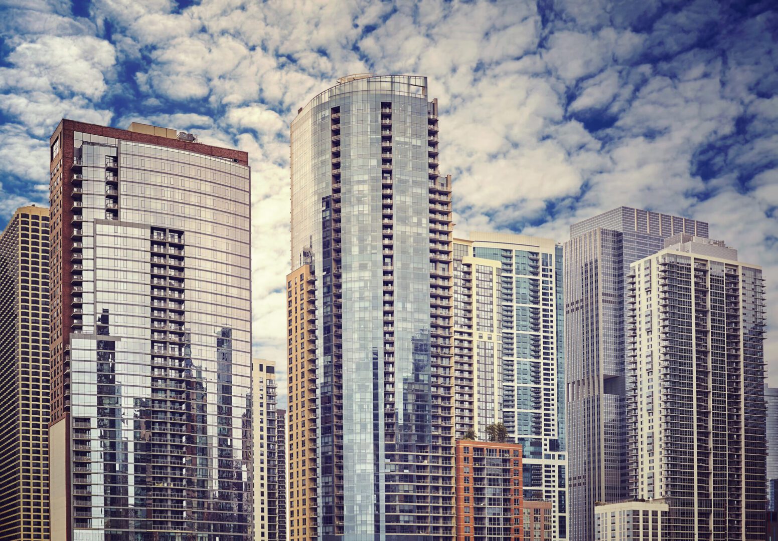 Skyscrapers under a cloudy sky